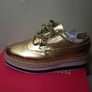 Golden platform shoes